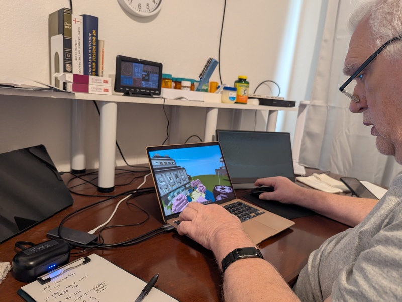 Don trying to line up three files together so that Downton Abbey looked right. It is a building I made in Minecraft years ago.