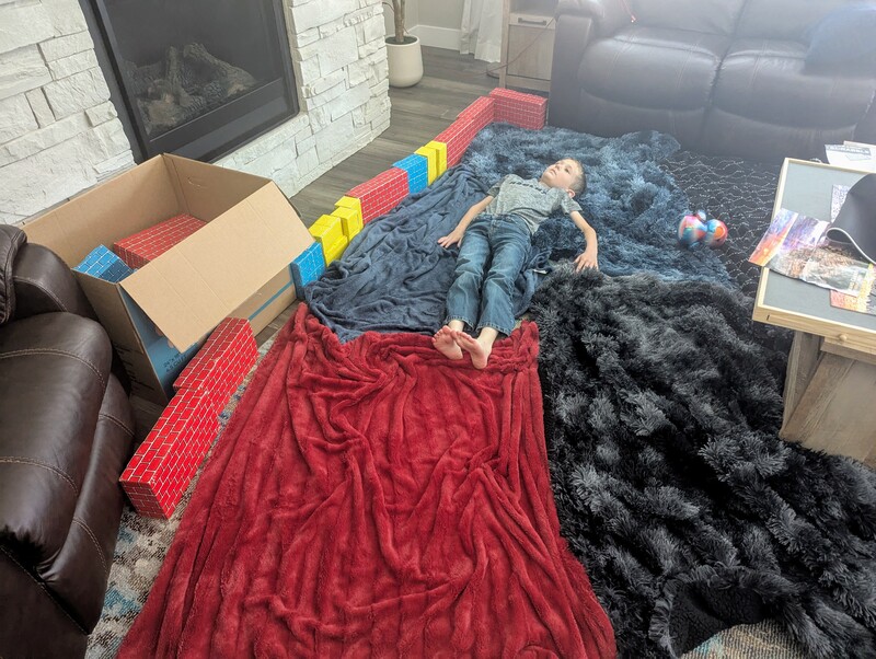 Austin's living room bed or play area.