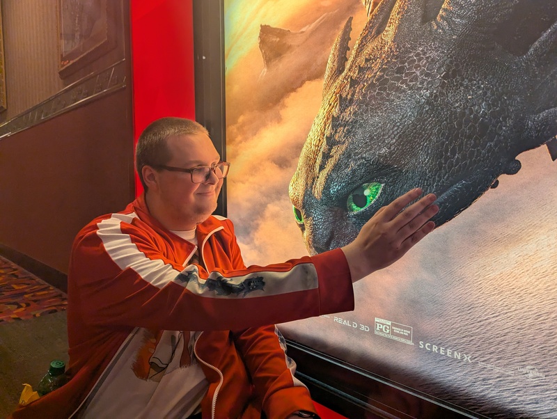 How to Train Your Dragon with Joshua petting Toothless.