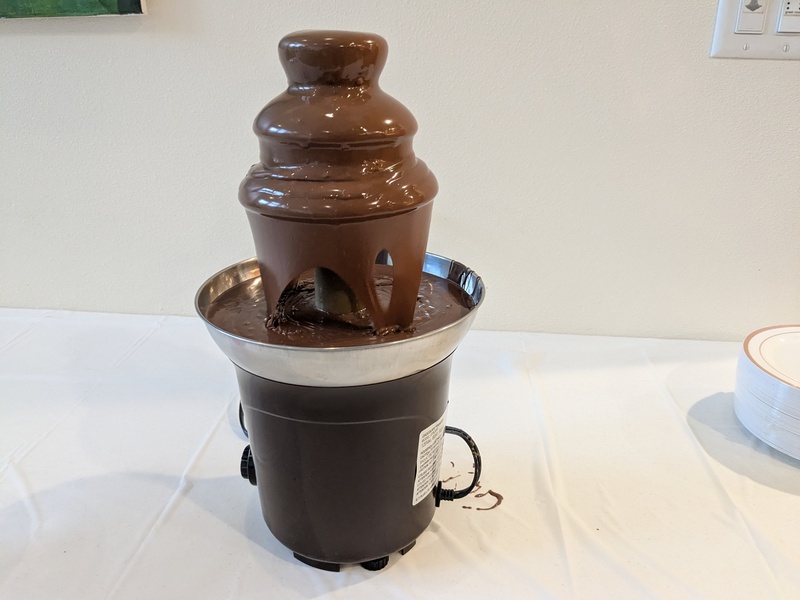 chocolate fountain with creme puffs