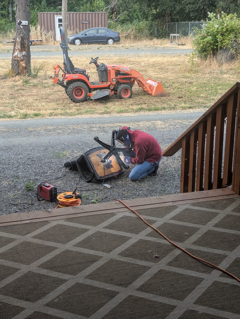 Alex welded a chair back together.