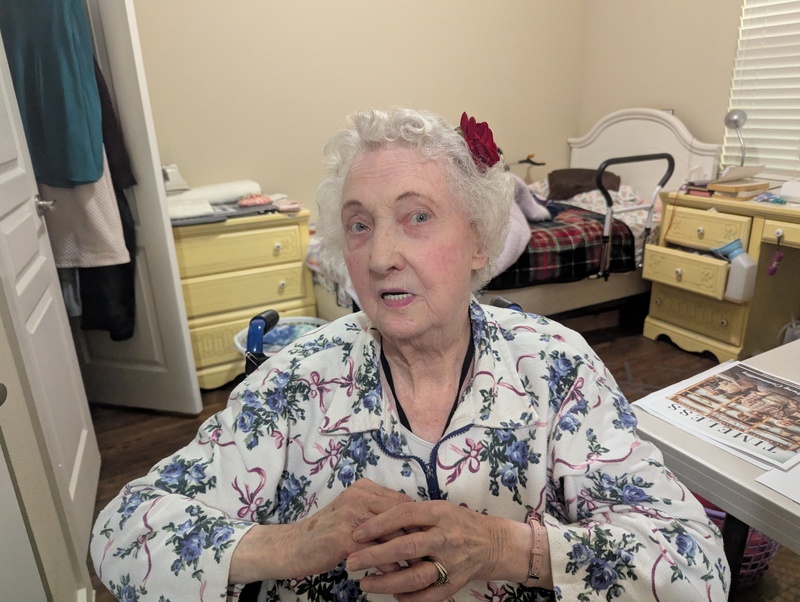 Jean is showing off her flower. We had a nice visit at her assisted living apartment.