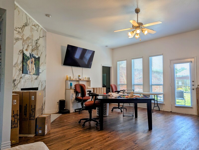 the family room turned into a work room.