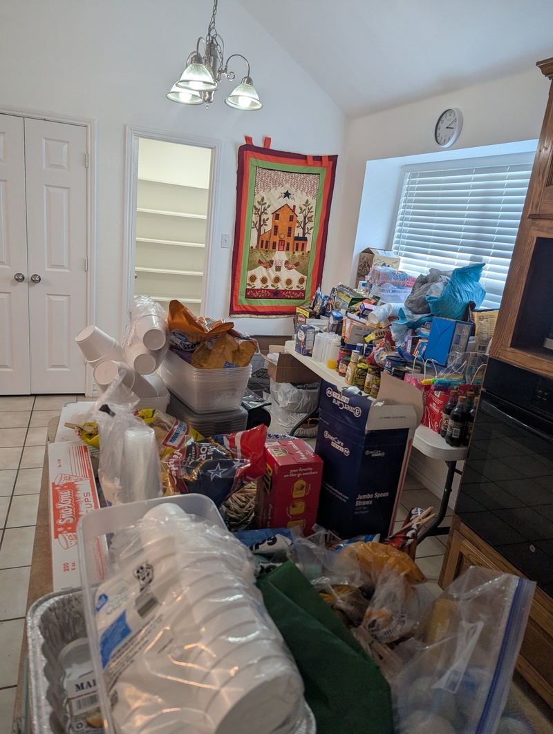 The pantry had a lot of things inside. It is now empty.