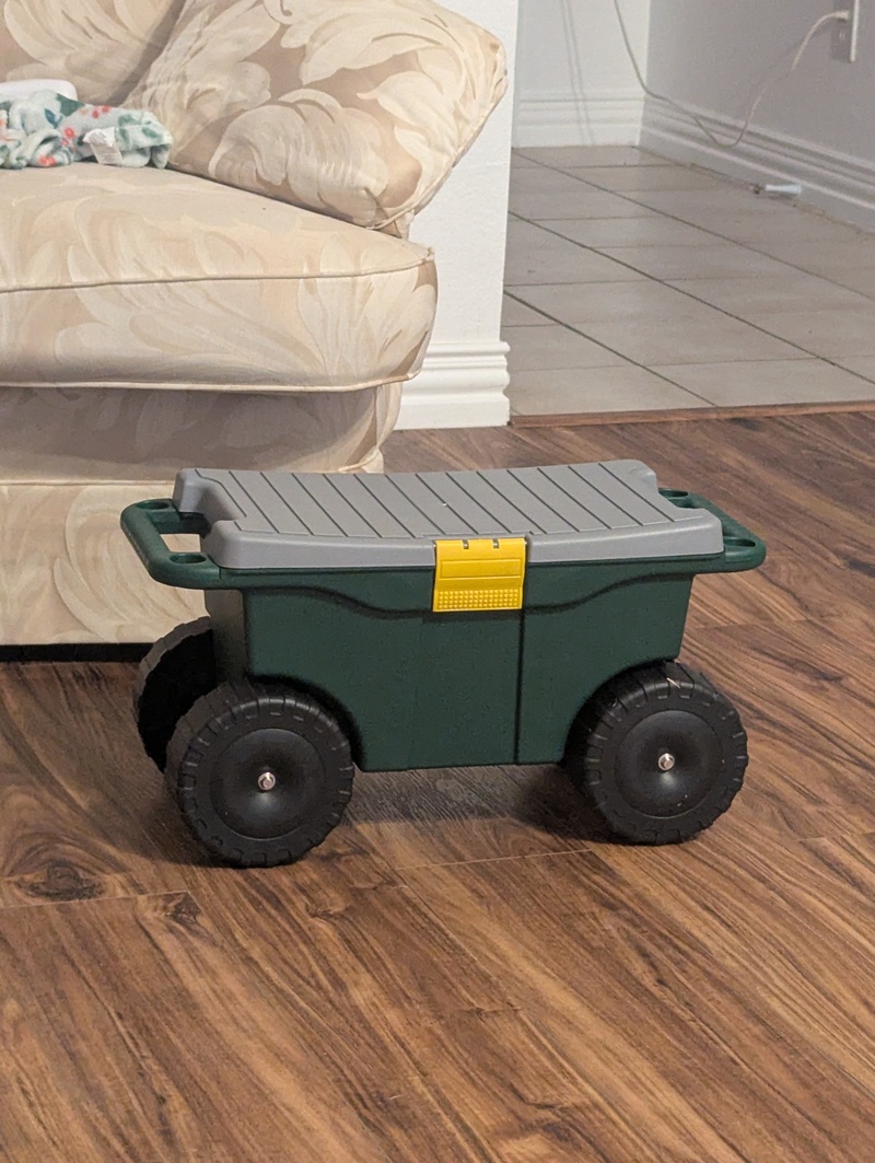 Don bought Lois a rolling cart to help her in weeding.
