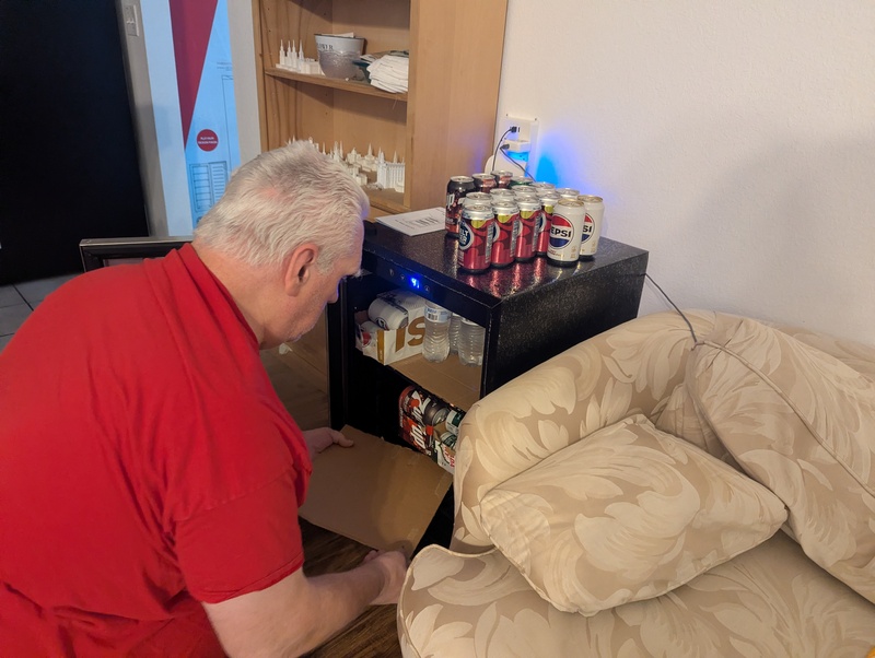 Don putting cardboard on shelves so that the water bottles stay upright better.