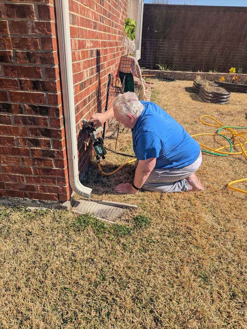 Don installs irrigation items for Lois