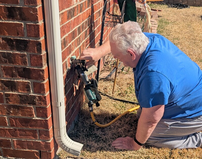 Don installs irrigation items for Lois