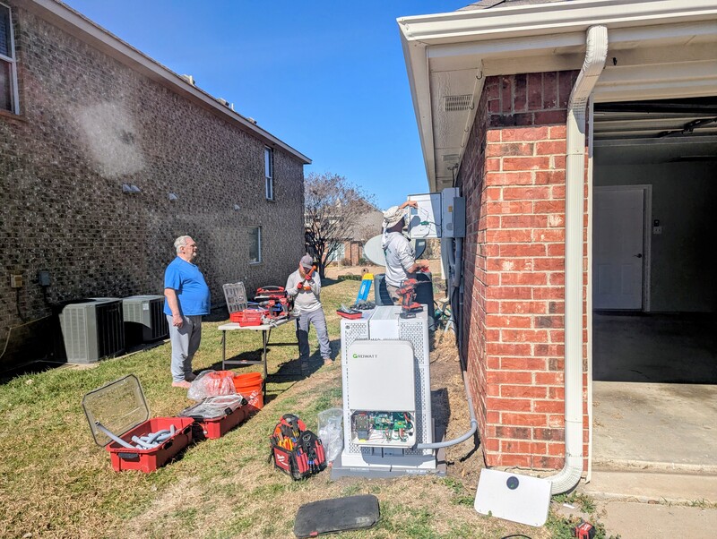 Base Power Don watches the workers.