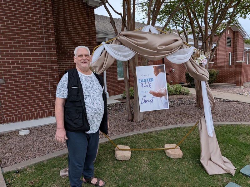 Don standing at the entrance of the Wylie Walk with Christ.