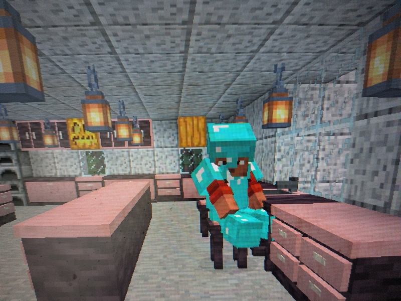 Lois in her Minecraft Kitchen.  It is quite nice.