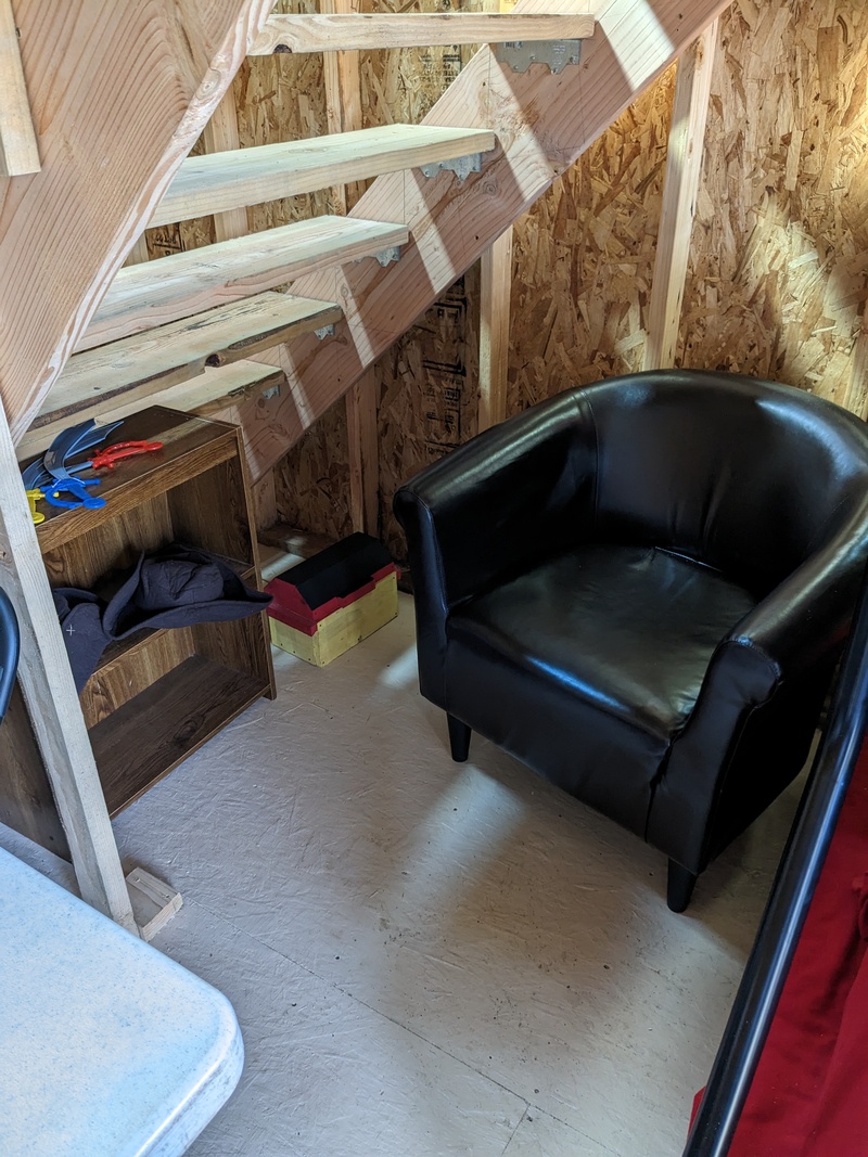 B2 Comfy reading chair under the stairs.