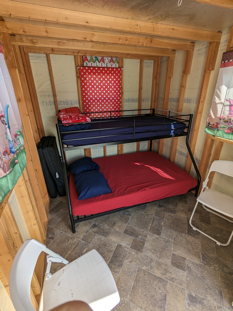 B4 Norway interior. Looks great inside!  Twin over full bunkbed.  Gnomes grace the windows.